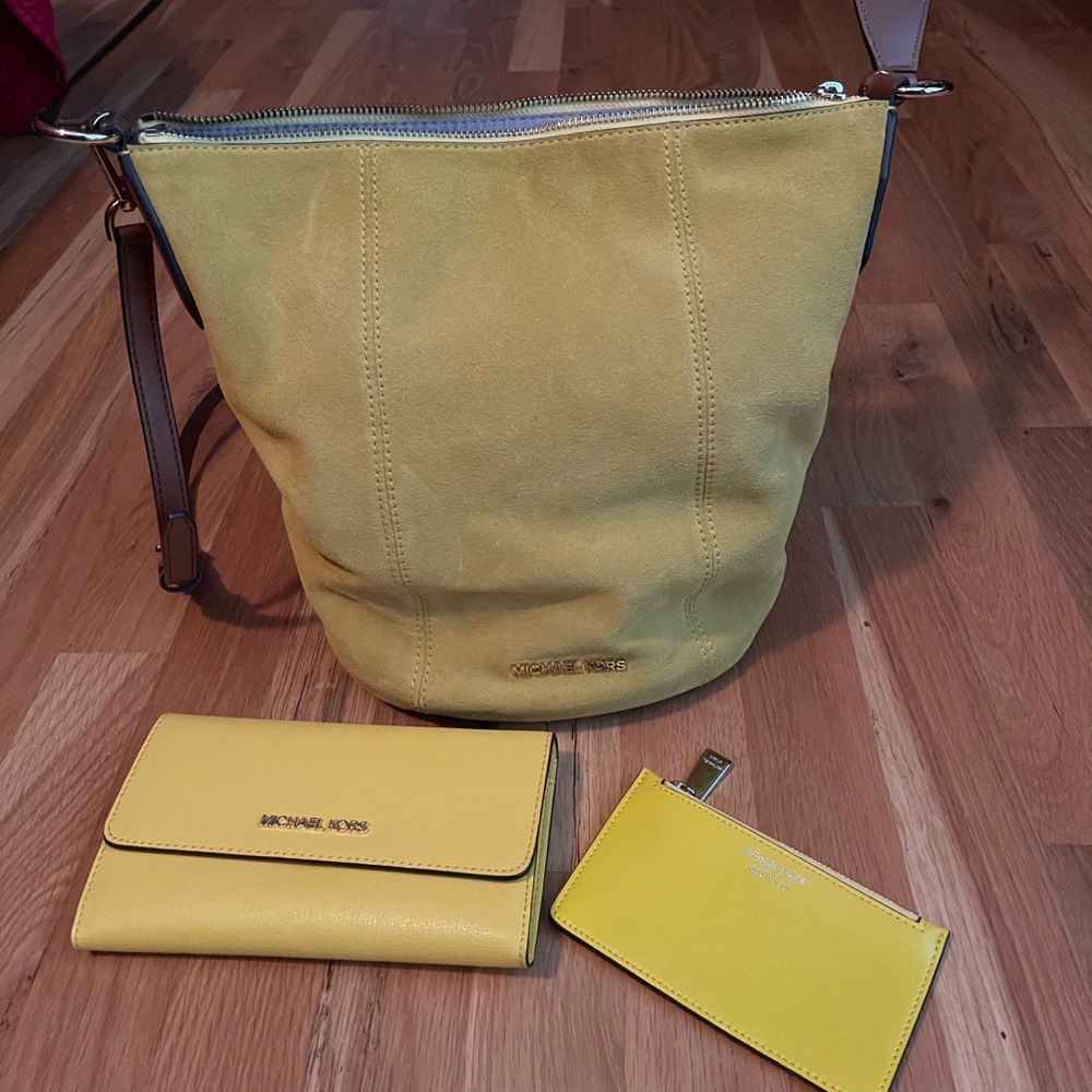 Michael Kors bag and 2 wallets